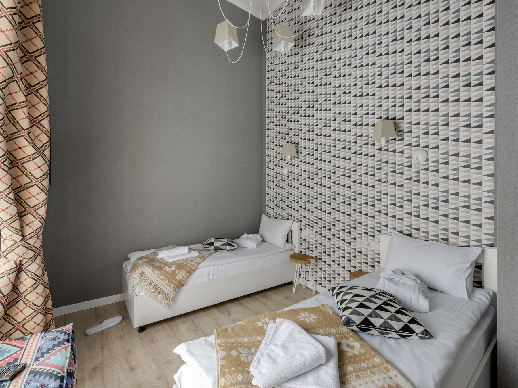Wallpapering in Elm Park — careful masking before painting begins
