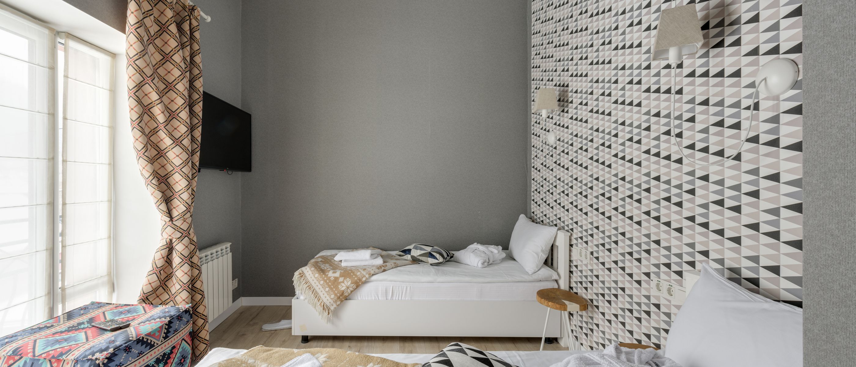 Wallpapering in New Malden — walls rolled to an even, flat finish