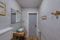 Stainless Steel Sink Near White Wooden Door