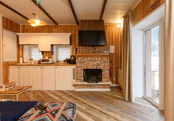 Cottage sitting room with beams — photo by Max Vakhtbovych on Pexels