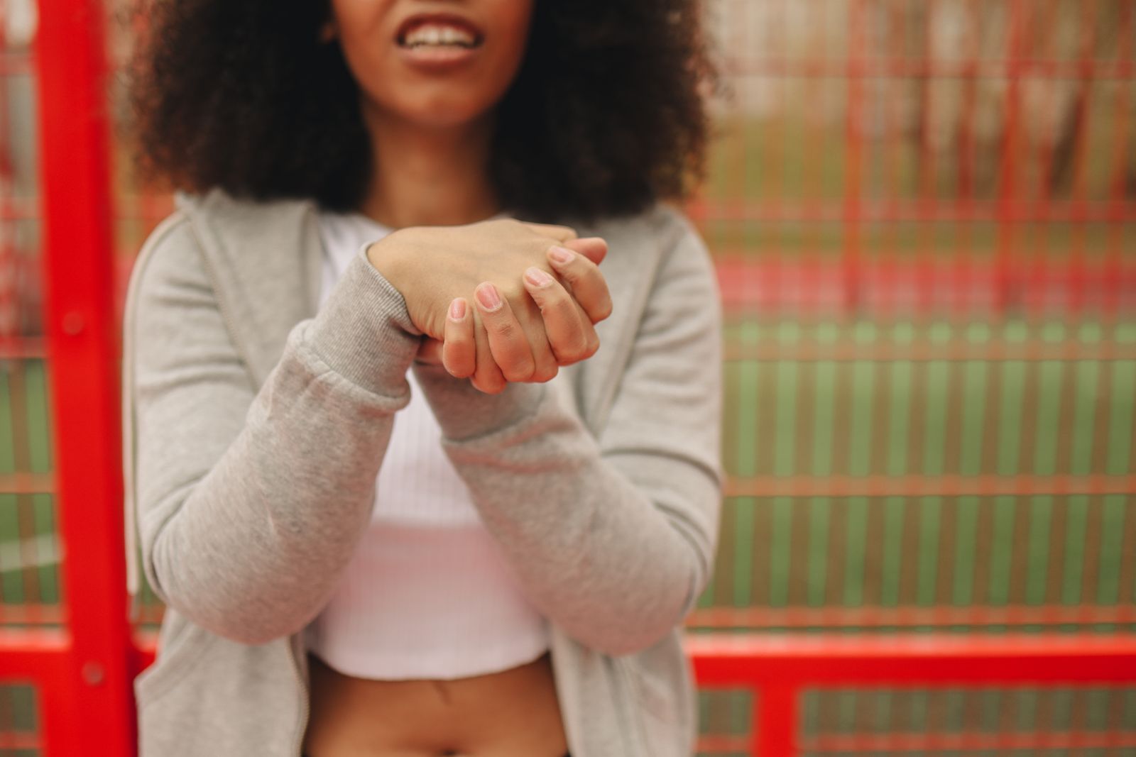 Person adjusting a wrist support before a daily activity