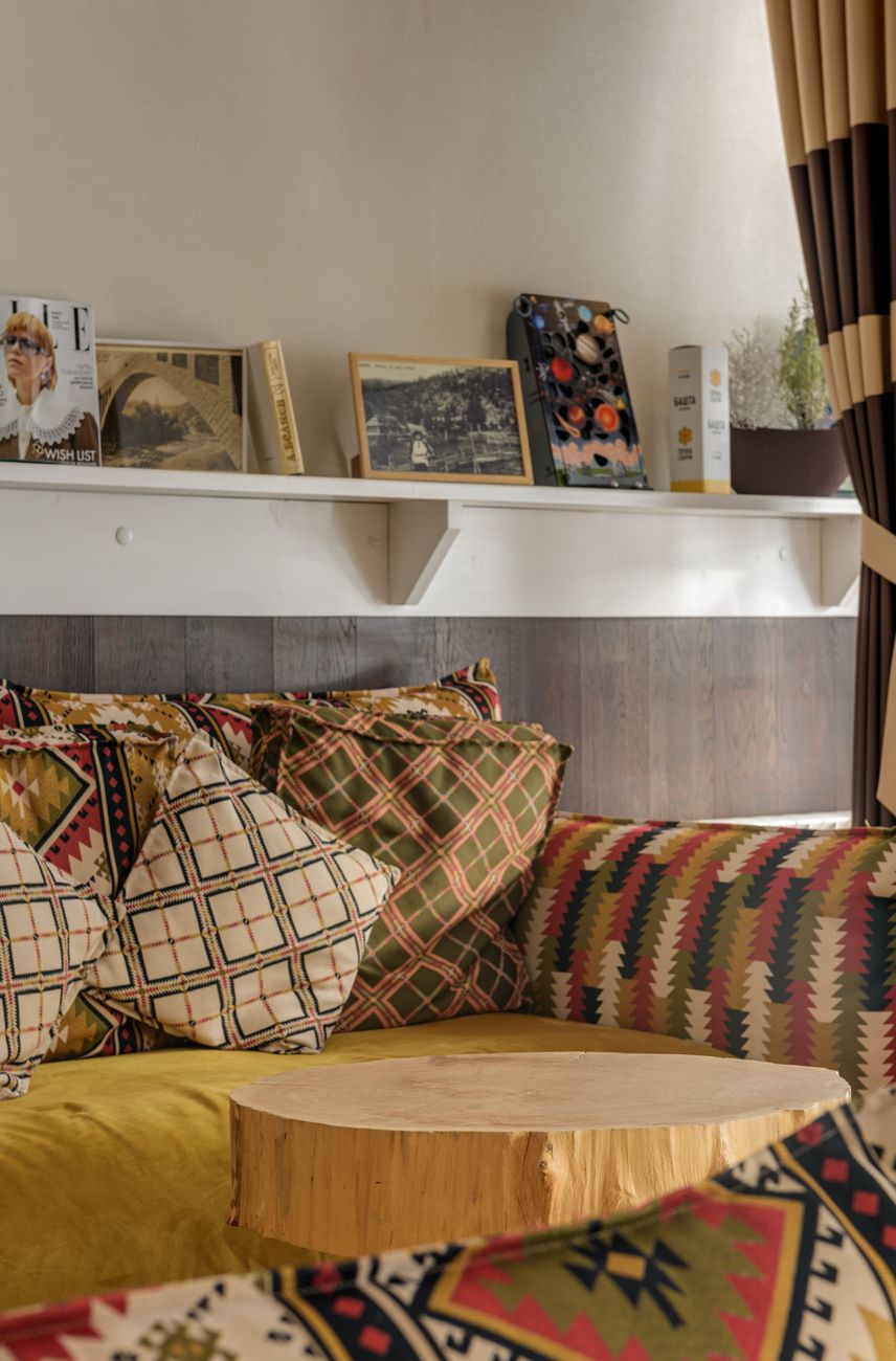 Photo by Max Vakhtbovych on Pexels living room sofa shelves window seating warm