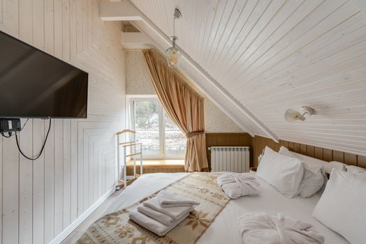 Hotel Room with TV and Bed