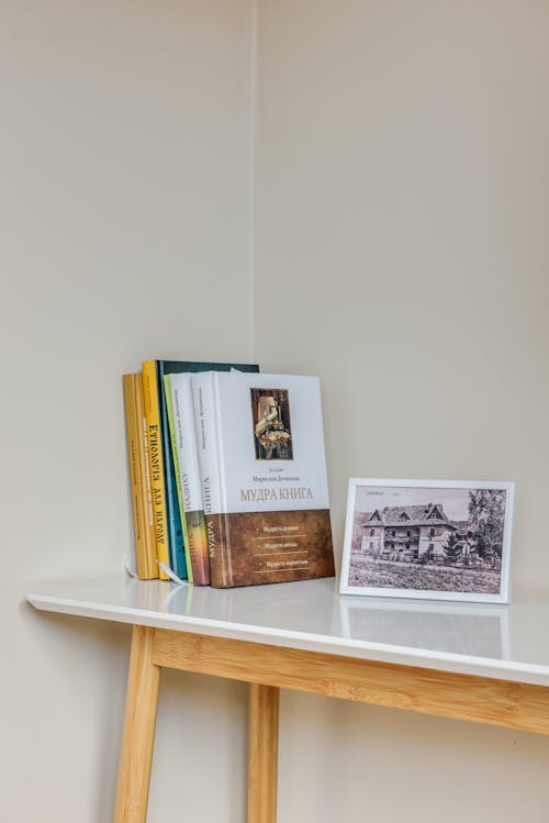 Organized Books on a Desk 



