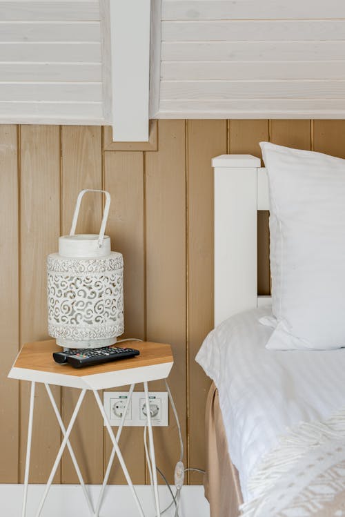Free Modern Bedside Table with a Lamp  Stock Photo