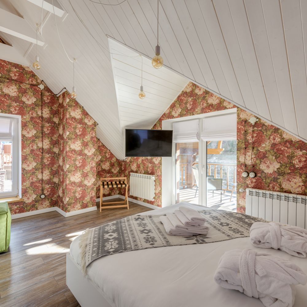 Wallpapering in Gallows Corner — dust sheets down and the room fully protected