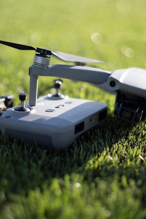 Free Close-up of a Drone Lying on Grass Stock Photo