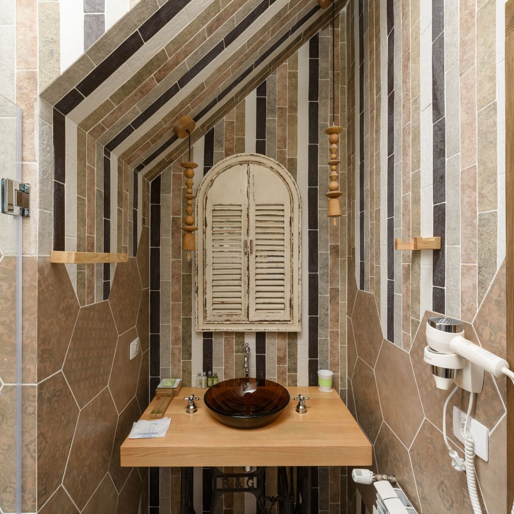 Wallpapering in Acton — woodwork brushed to a crisp, smooth line