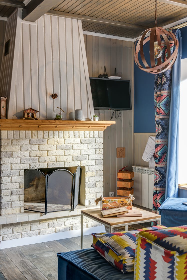 TV And Fireplace In Room