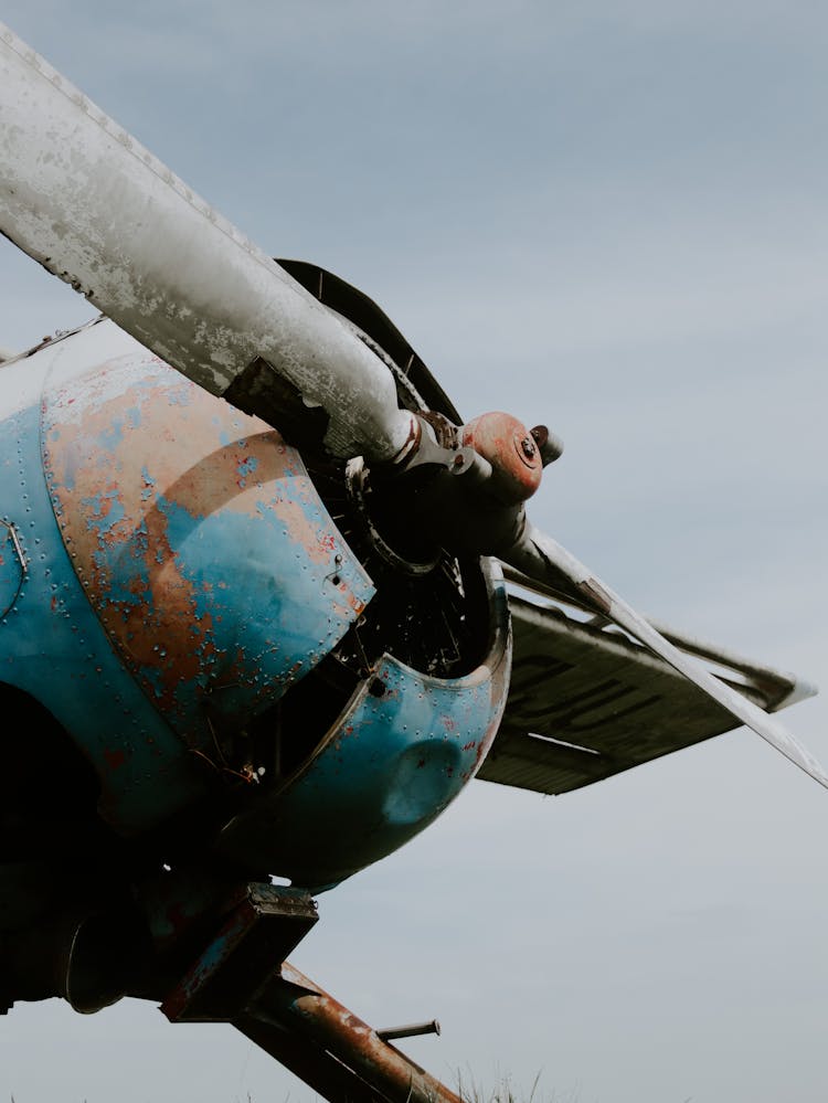 Close-up Of Old Plane Nose With Propeller