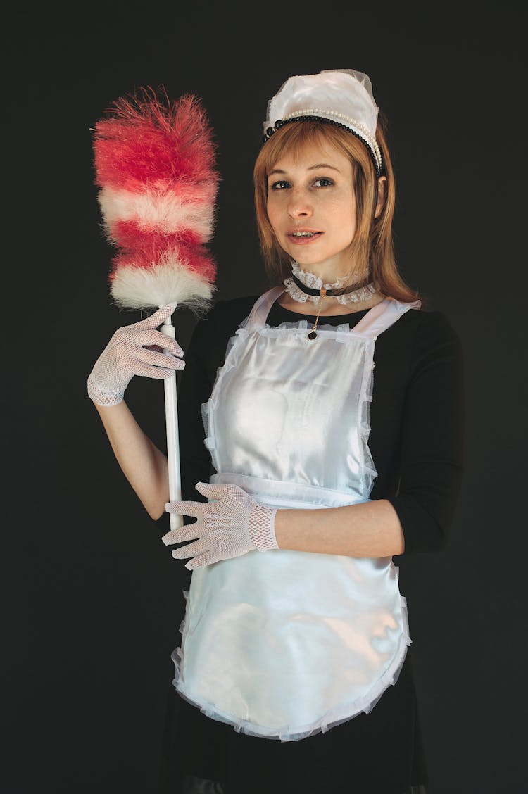 A Woman In A Maid Outfit