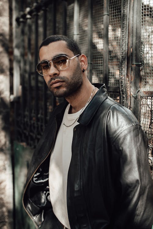 Man in Black Leather Jacket Wearing Sunglasses