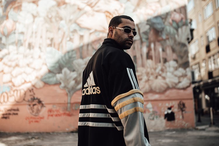 Man With Black Sunglasses Wearing Black And White Jacket  