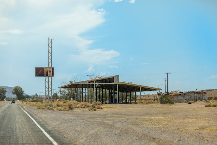 Abandoned Gas Station Under Blue Sky