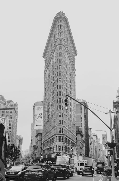Grayscale Photo of Flatiron Building in New York City