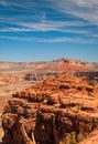 Brown Rocky Mountain Under Blue Sky