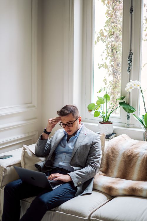Man Holding Macbook Pro · Free Stock Photo