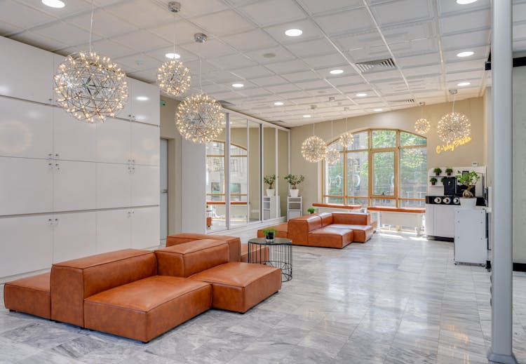 Brown Couch On Marble Floor