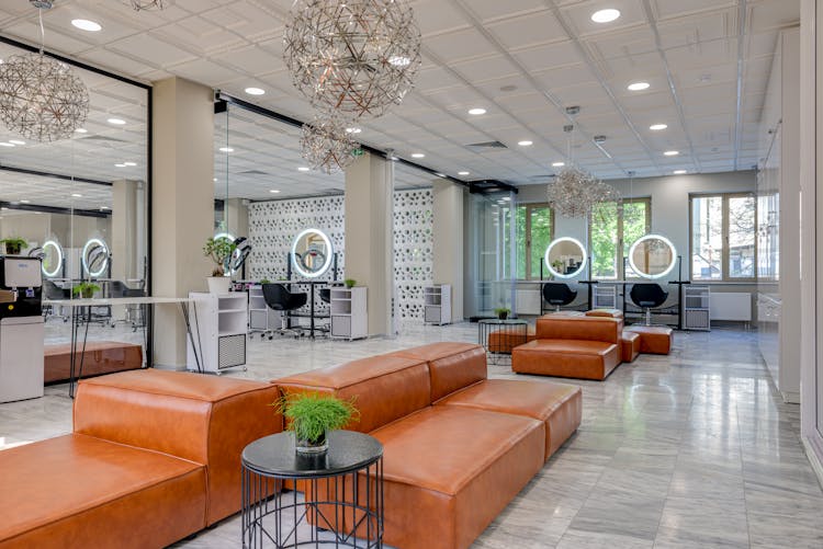 Brown Leather Couch On Marble Floor