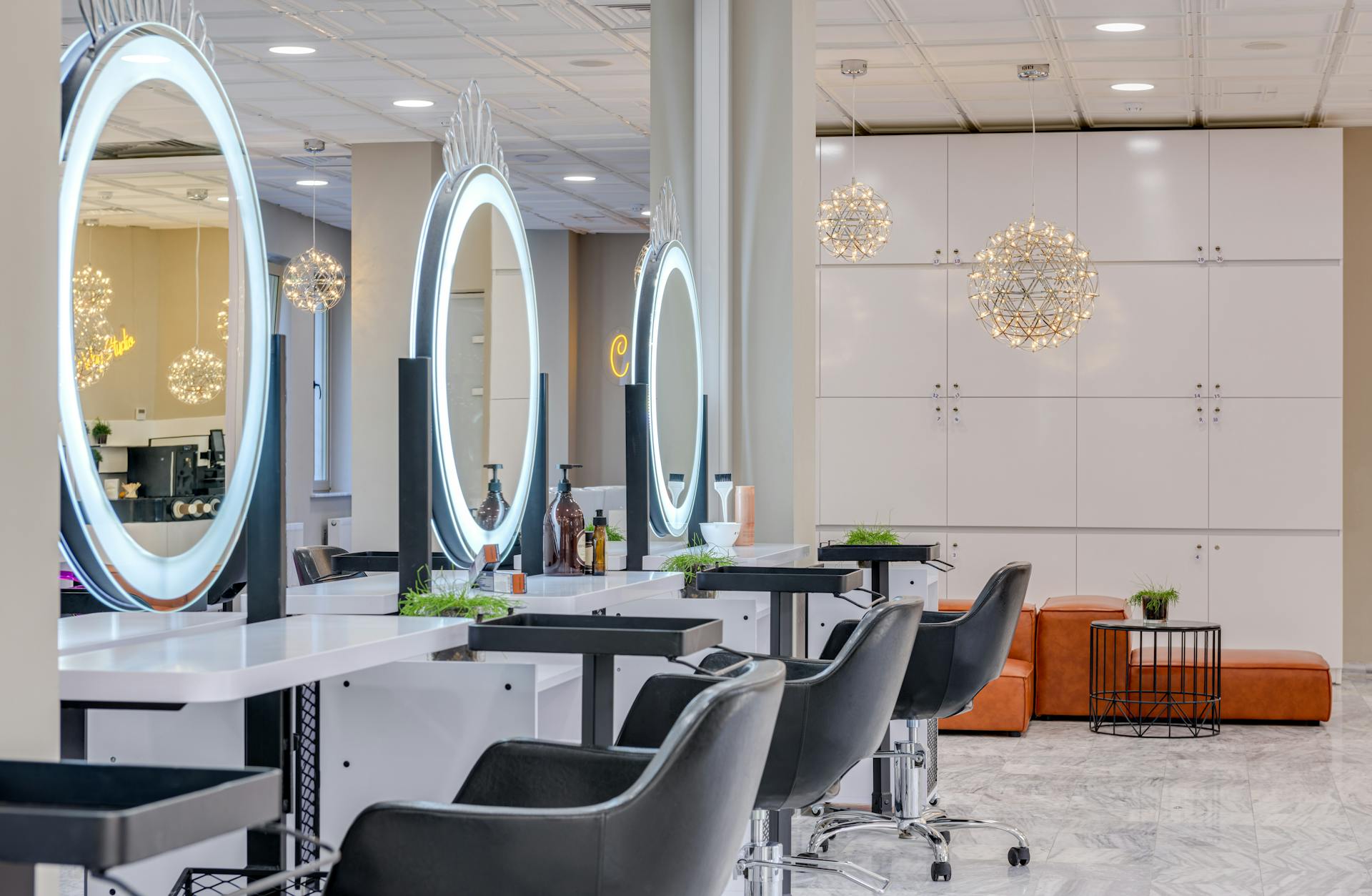 Leather Chairs in front of Round Mirrors