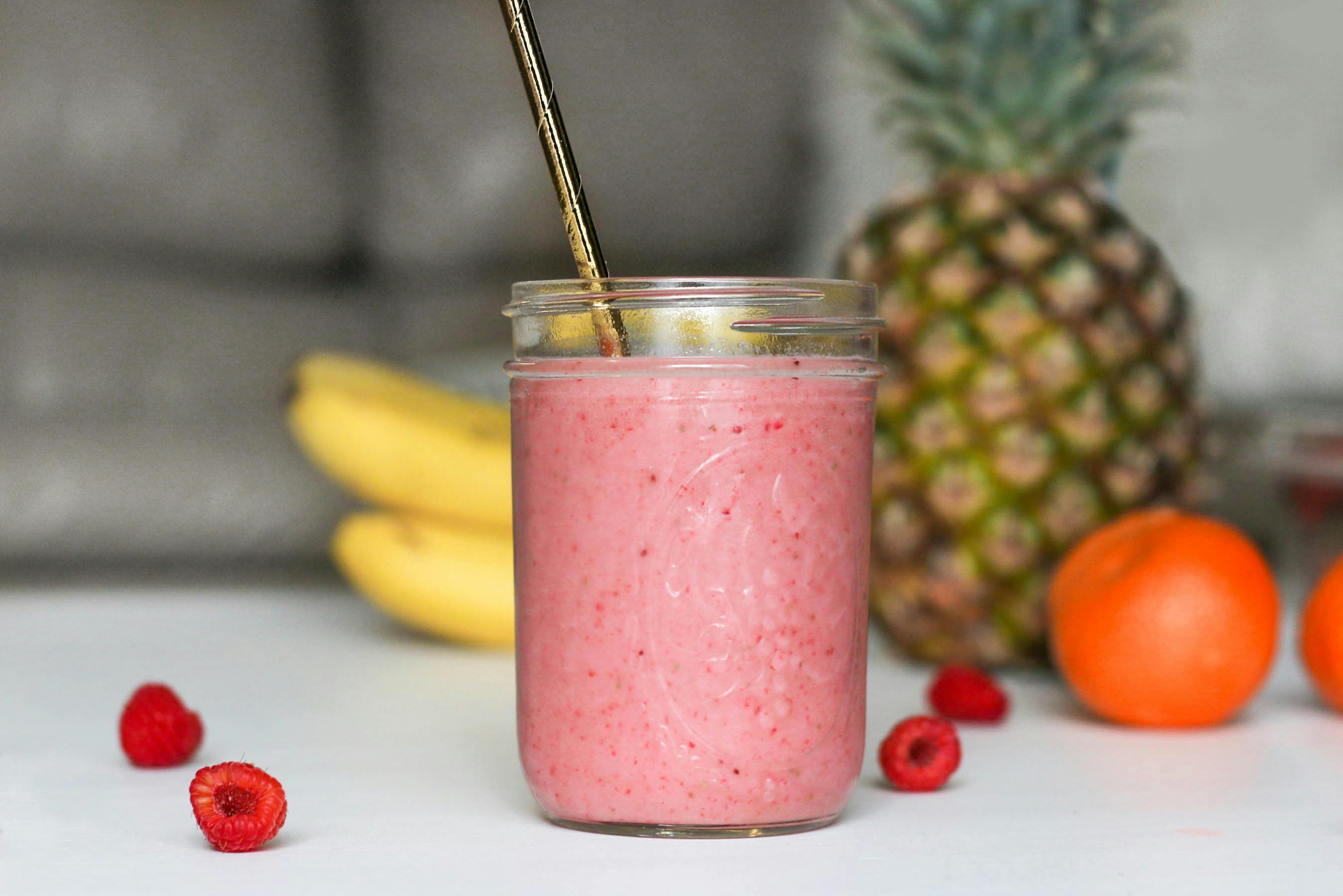 pink smoothie with wild cranberries in mason jar with mint and straw on  wooden background Stock Photo by nblxer