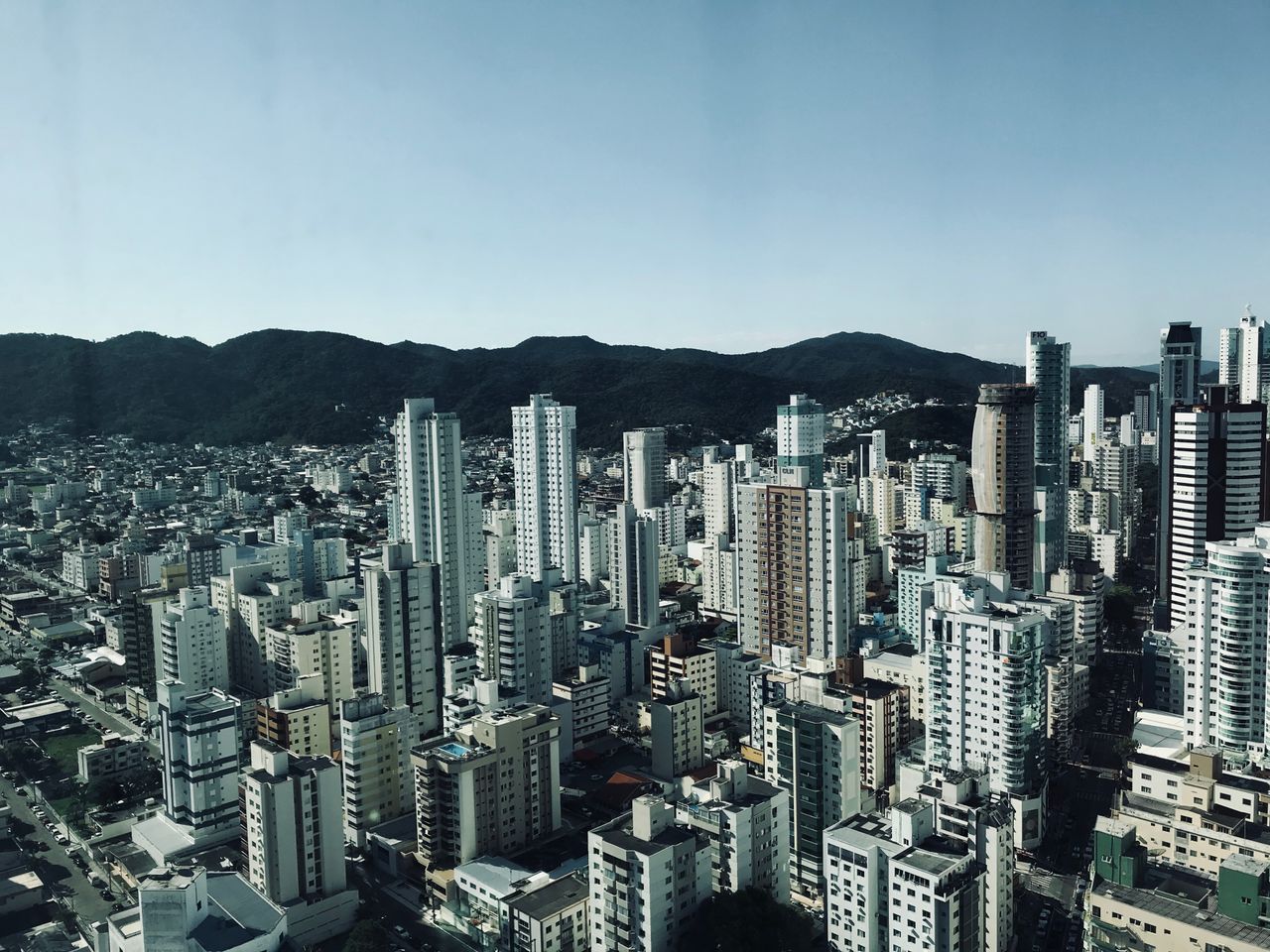 Discover the stunning skyline of Balneário Camboriú from above, highlighting its iconic skyscrapers.