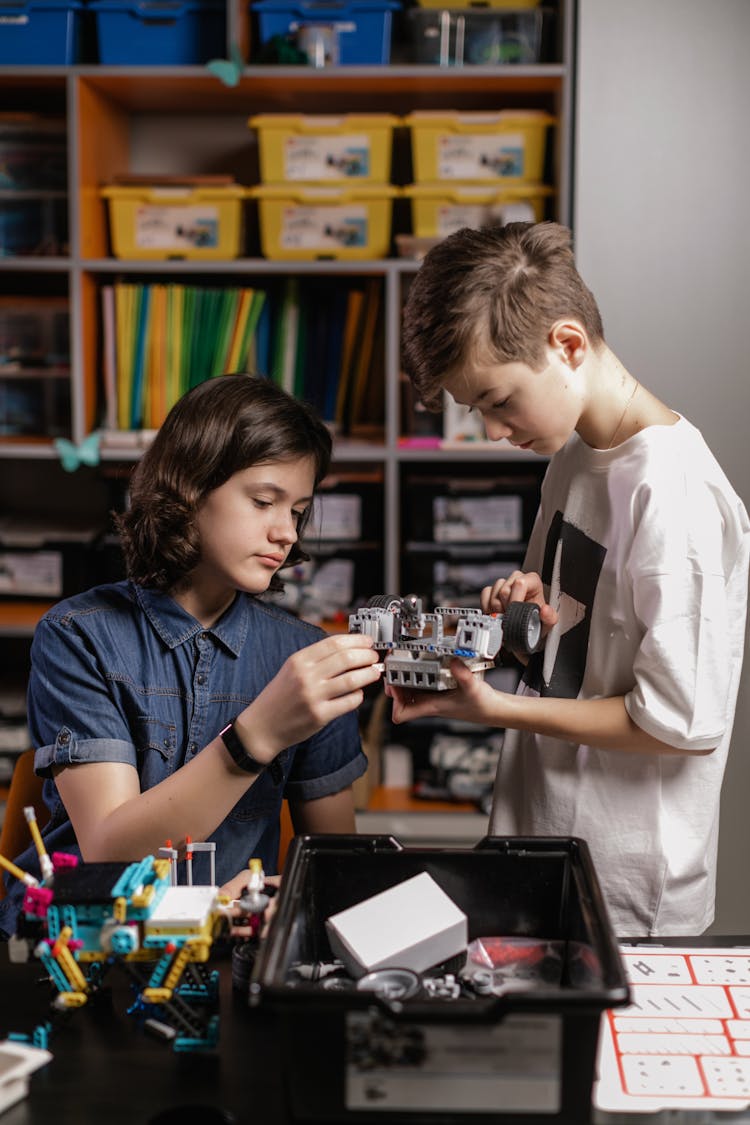 Two Boy Building With Lego Blocks 