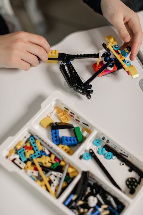 A Person Playing Legos