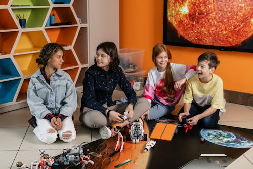 Free Kids Sitting on the Floor Stock Photo