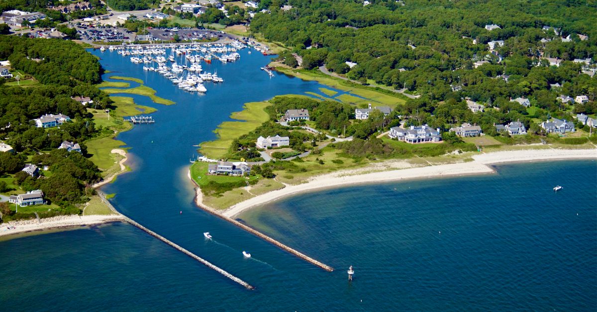 Stunning aerial view of Harwich Harbor showing boats and lush landscapes in Massachusetts.