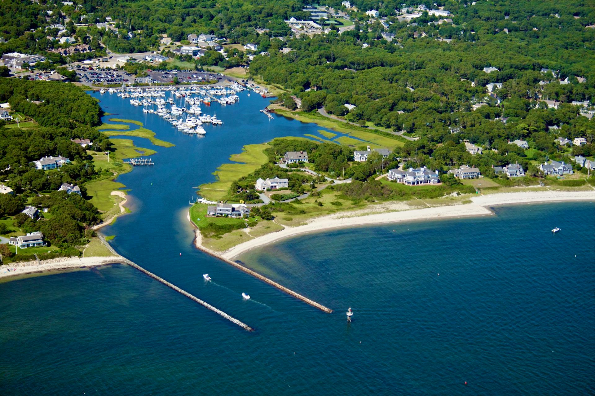 Stunning aerial view of Harwich Harbor showing boats and lush landscapes in Massachusetts.