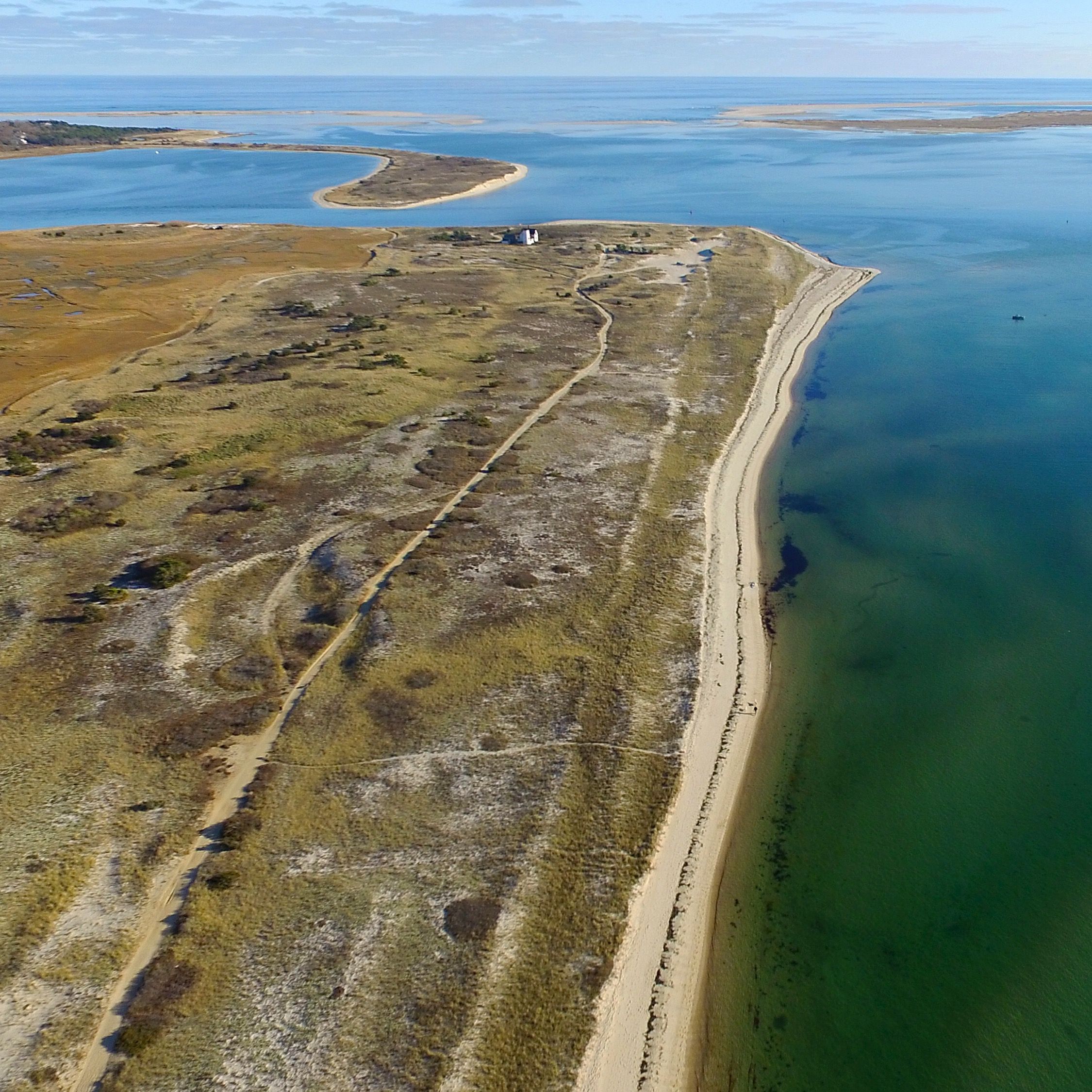 Aerial view of a tidal coastline — photo by Christopher Seufert on Pexels
