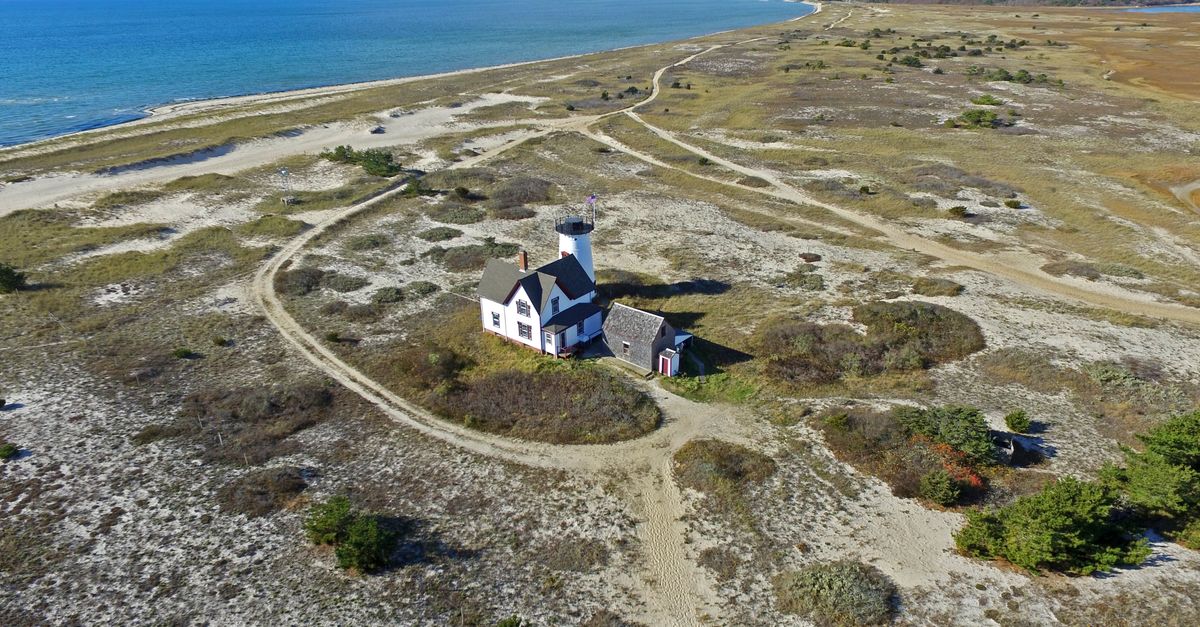 A beautiful aerial view of Chatham Lighthouse on the Cape Cod coastline in Massachusetts.