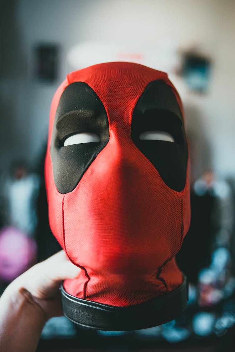 Close-up Photo Of A Deadpool Head Toy