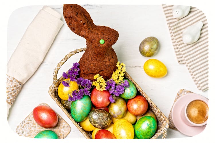 Bunny Shaped Bread And Painted Eggs On A Basket