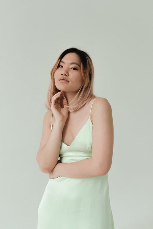 A Pretty Woman Wearing a Green Dress Free Stock Photo A Pretty Woman Wearing a Green Dress Free Stock Photo