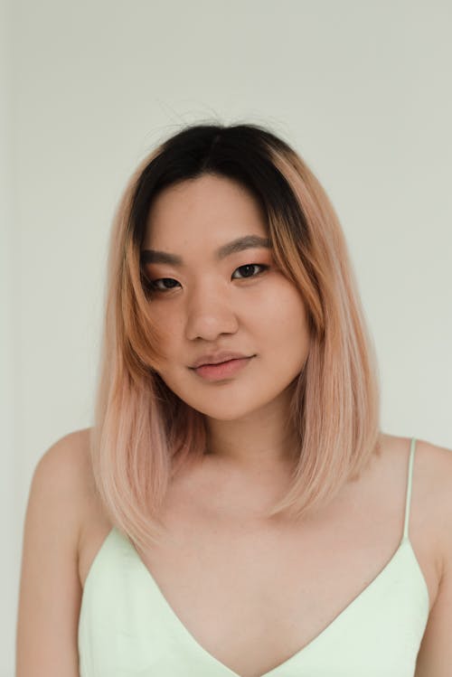 Close Up Photo of a Woman with Colored Hair