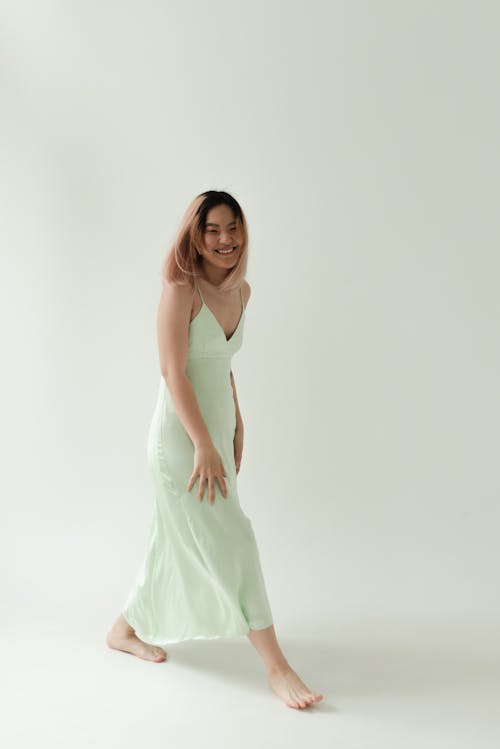 Woman in Green Dress Laughing
