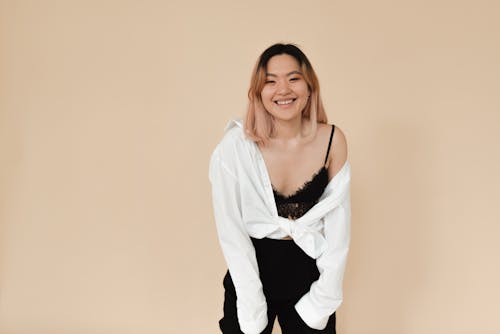 Woman in White Long Sleeves Smiling