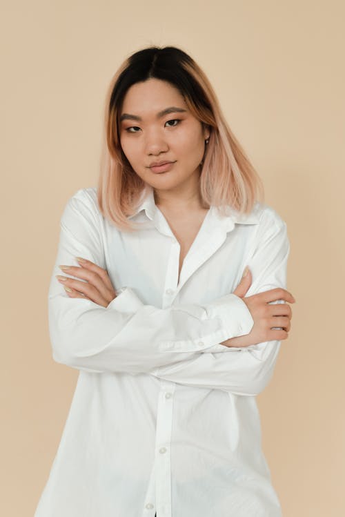 Woman in White Button Down Shirt