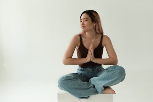 Free Woman in Yoga Sitting Position Stock Photo