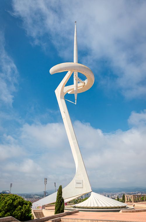 Free Vertical view of the Montjuïc Communications Tower in Barcelona, Spain, with clear blue skies. Stock Photo
