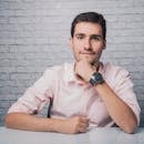 Handsome man in shirt and wristwatch