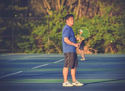 A Man Playing Tennis