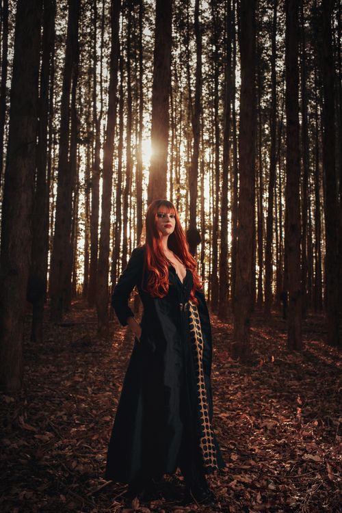 A Woman Standing in the Woods · Free Stock Photo