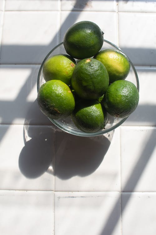 Fresh Limes on Glass Bowl