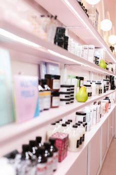 A stylish display of various hair care products in a contemporary salon setting.