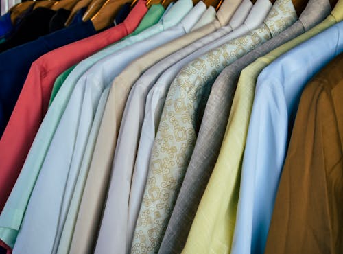 Assorted Polos Tightly Hanging in Close-up Shot