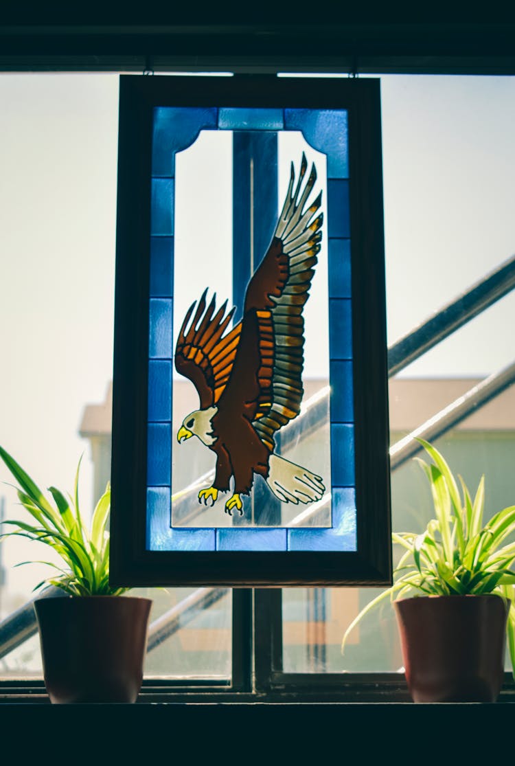 A Stained Glass With Eagle Design