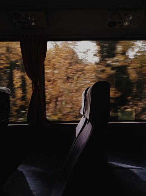 Free Passenger seat view in a moving bus during autumn in İnegöl, Turkey. Stock Photo